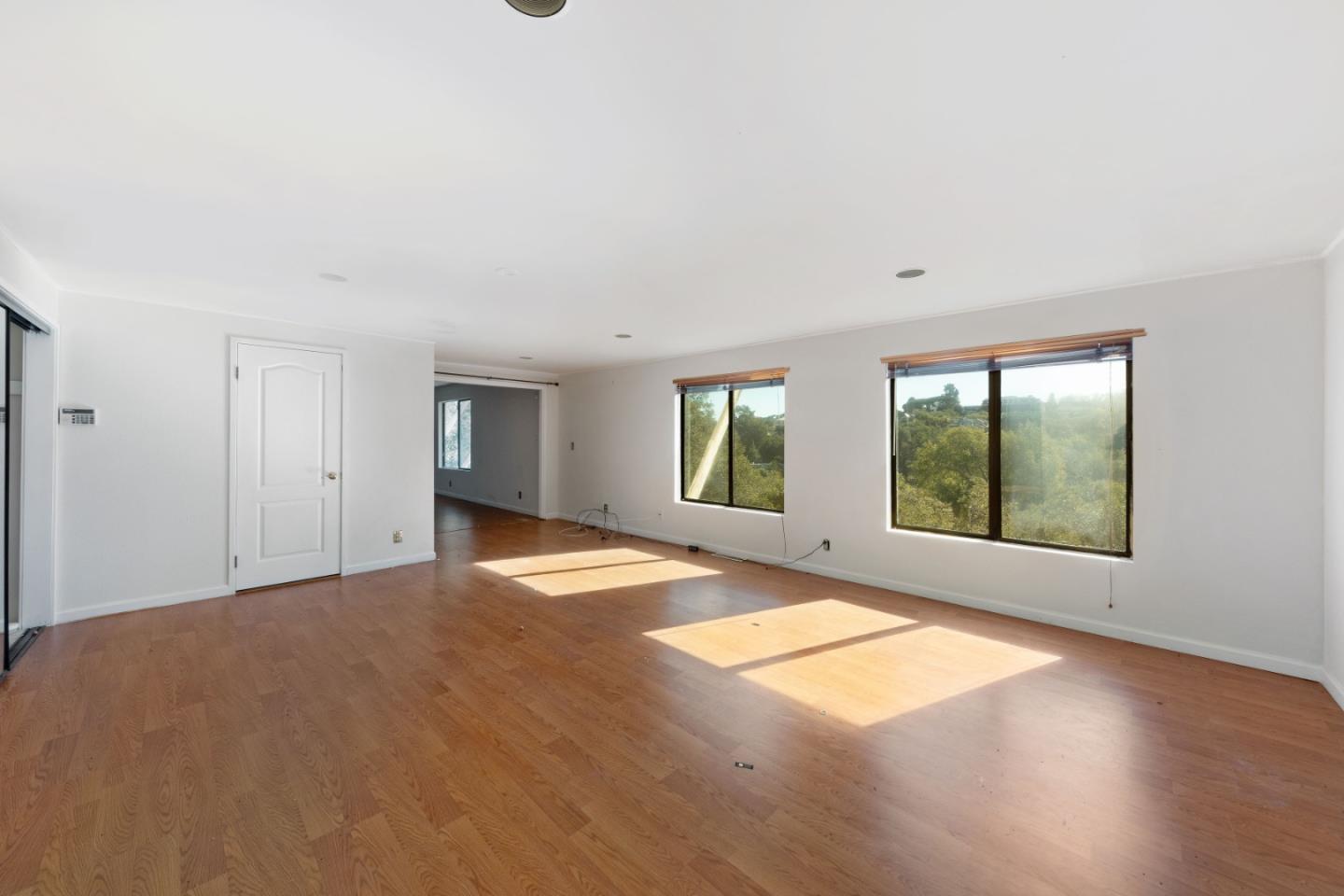 20 Pine Court Hillsborough, CA 94010 - Photo 8 of 14 an empty room with large windows