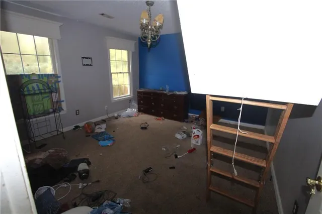 a room with lots of furniture and toys