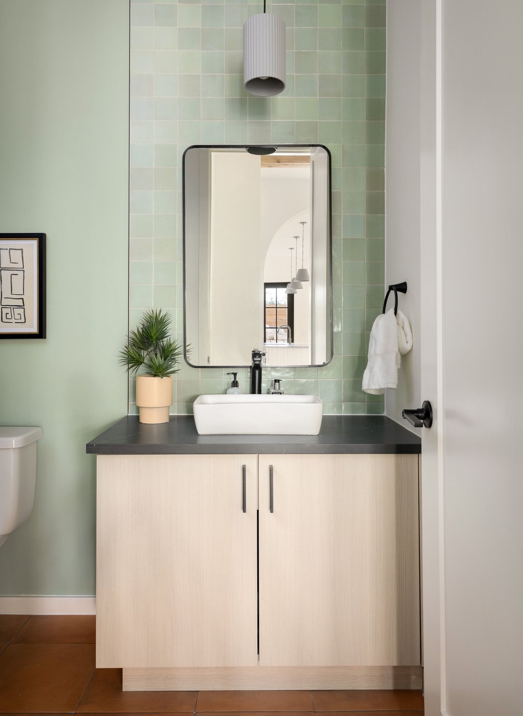 3500 Pecan Springs Road, Unit 9 Austin, TX 78723 - Photo 28 of 40 Powder bath on 1st level for guests.