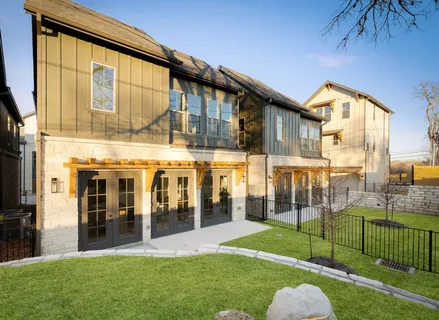 a view of a building with a yard