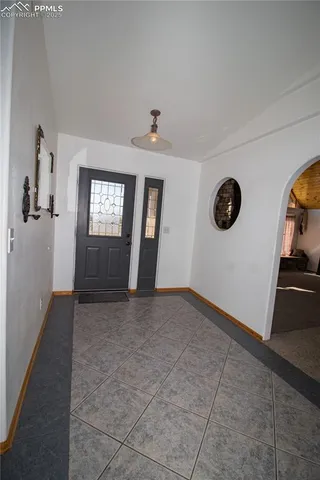a view of livingroom with hardwood floor and a ceiling fan