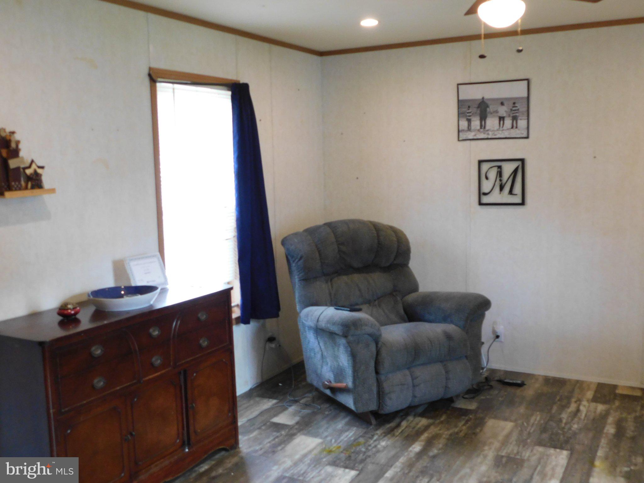 119 Meadow Lane Lititz, PA 17543 - Photo 4 of 13 a living room with furniture and a window