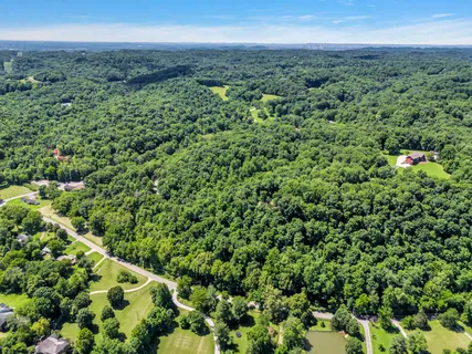 a view of a field with an outdoor space