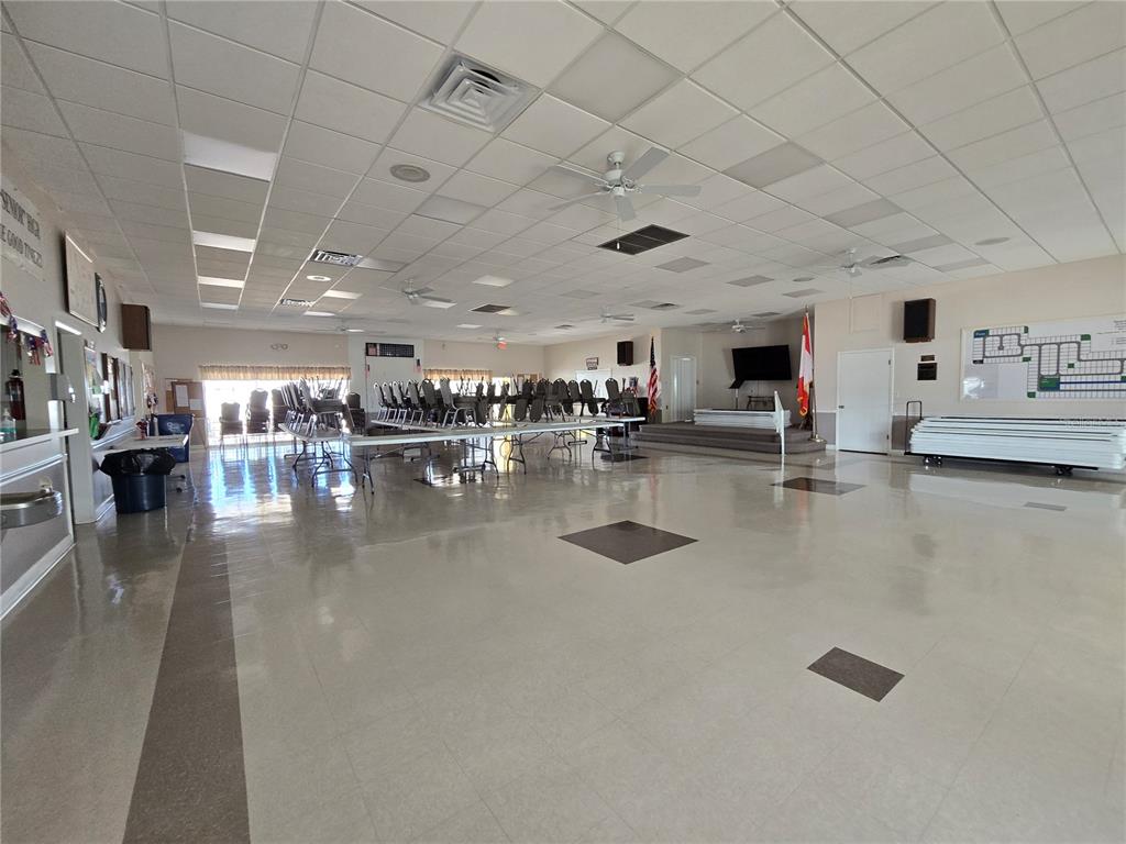 5619 Bayshore Road, Unit 435 Palmetto, FL 34221 - Photo 54 of 56 a gym room with lots of furniture and a view of living room