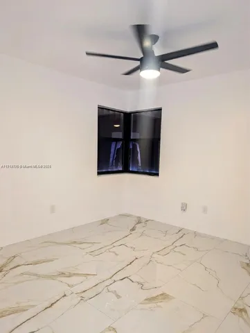 a view of a ceiling fan in a room