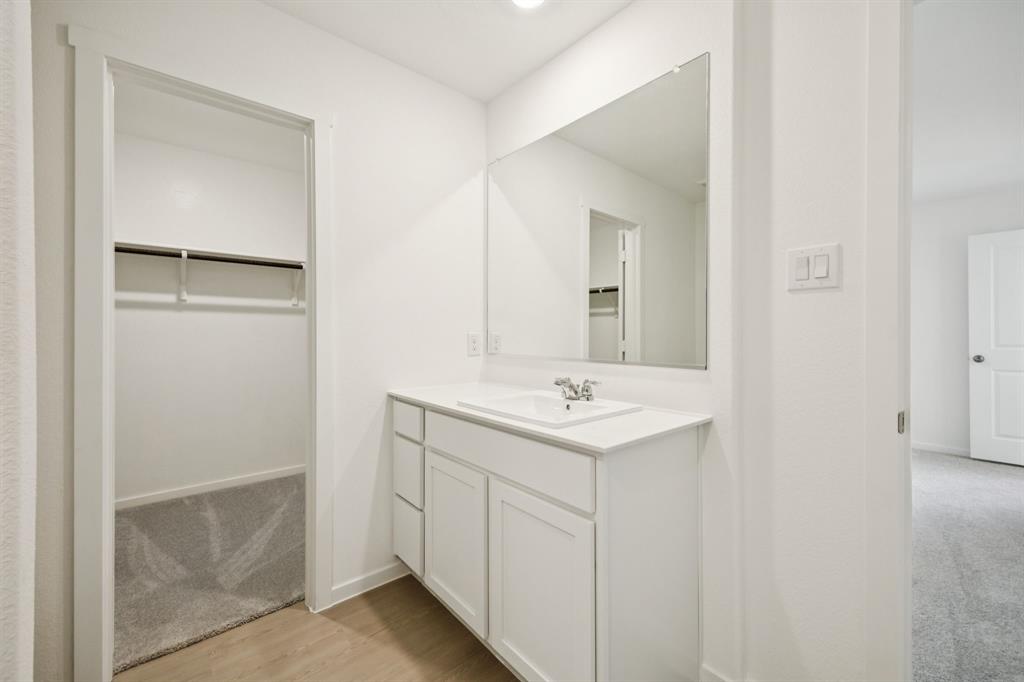 11522 Gammon Avenue Rhome, TX 76078 - Photo 14 of 25 Bathroom with a walk in closet