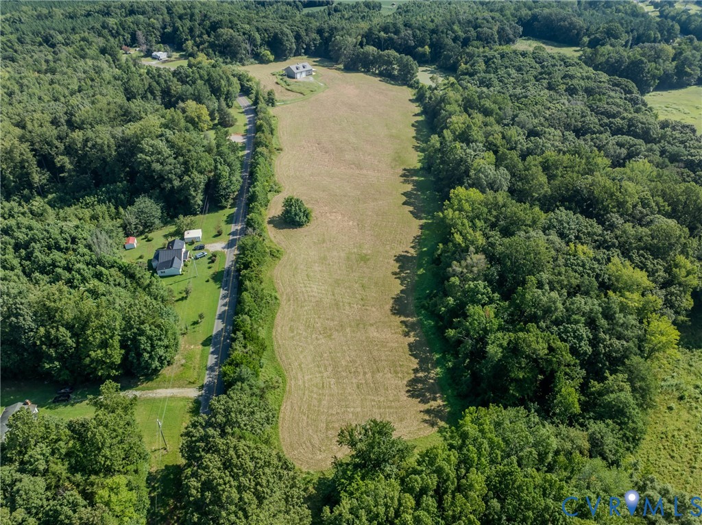 6721 Amelia Springs Road Jetersville, VA 23083 - Photo 2 of 16 an aerial view of residential house with outdoor space and trees all around