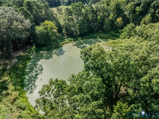 a view of a lake with a house
