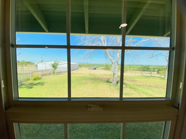a kitchen with a stove a sink and a refrigerator