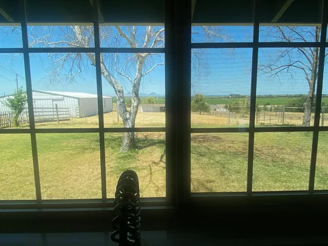 en view of an empty room with a window
