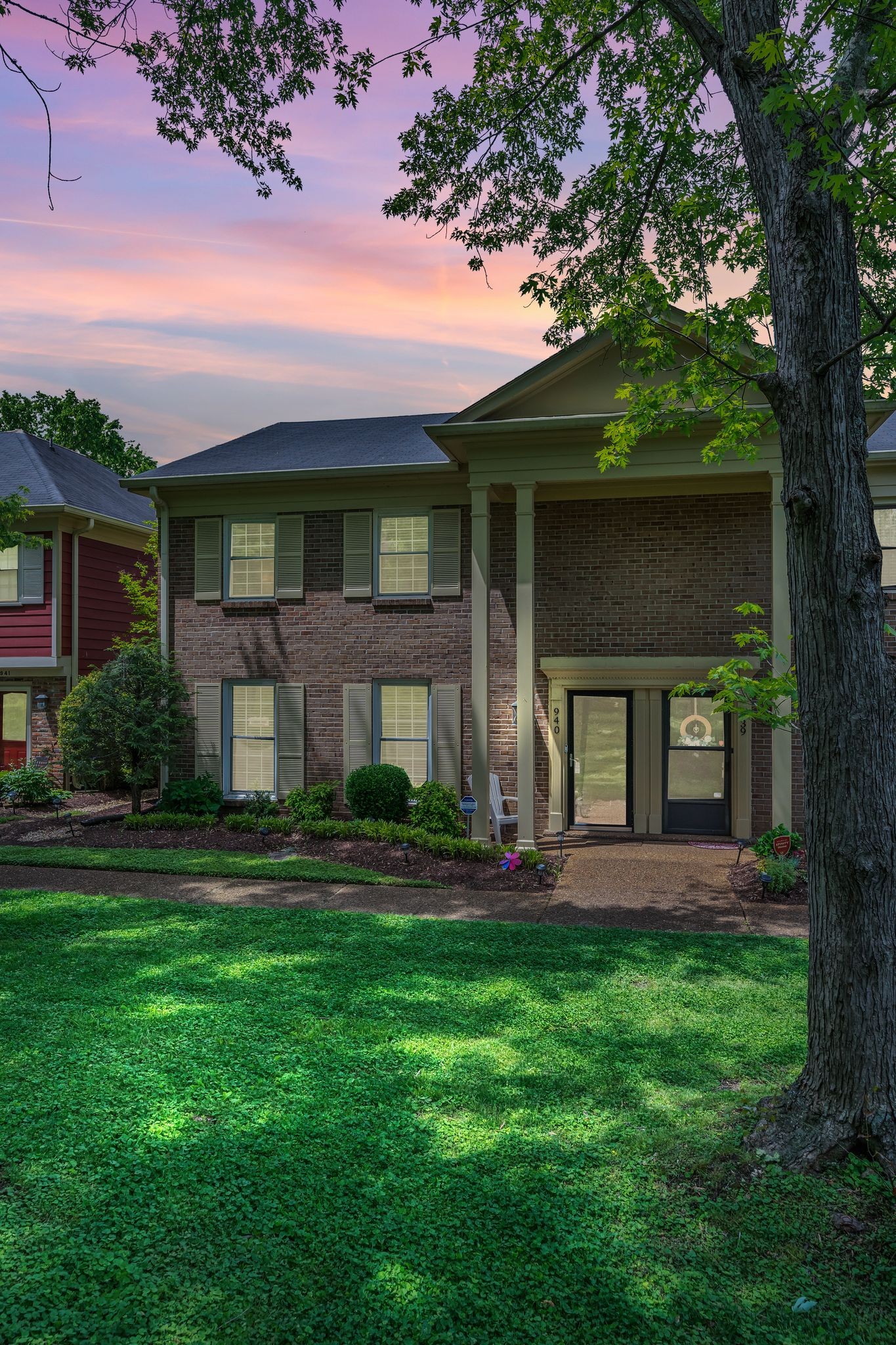 940 General George Patton Road Nashville, TN 37221 - Photo 5 of 35 a front view of a house with a garden