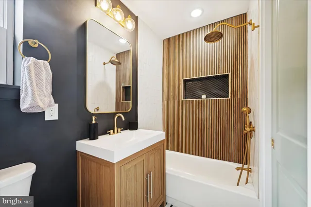 a close view of a utility room with washer and dryer