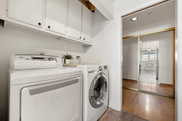 a utility room with dryer and washer