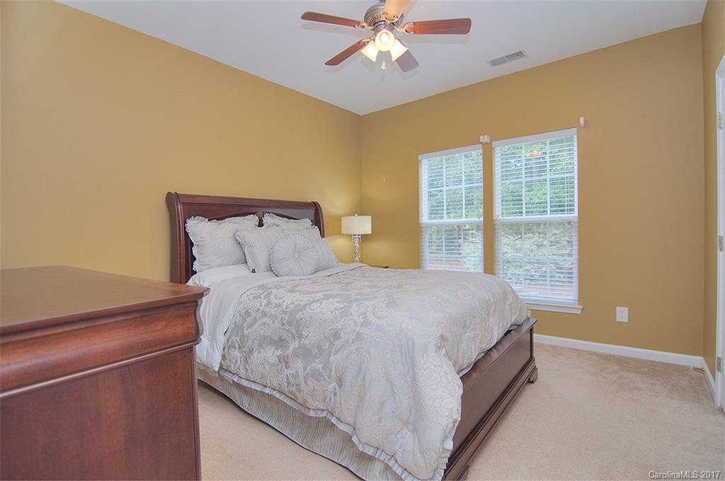 221 Choate Avenue Fort Mill, SC 29708 - Photo 12 of 24 a bedroom with a bed and window