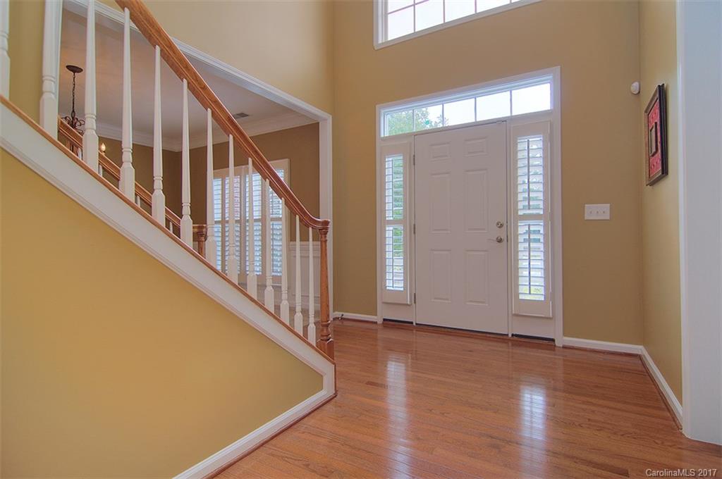 221 Choate Avenue Fort Mill, SC 29708 - Photo 3 of 24 a view of an entryway with wooden floor