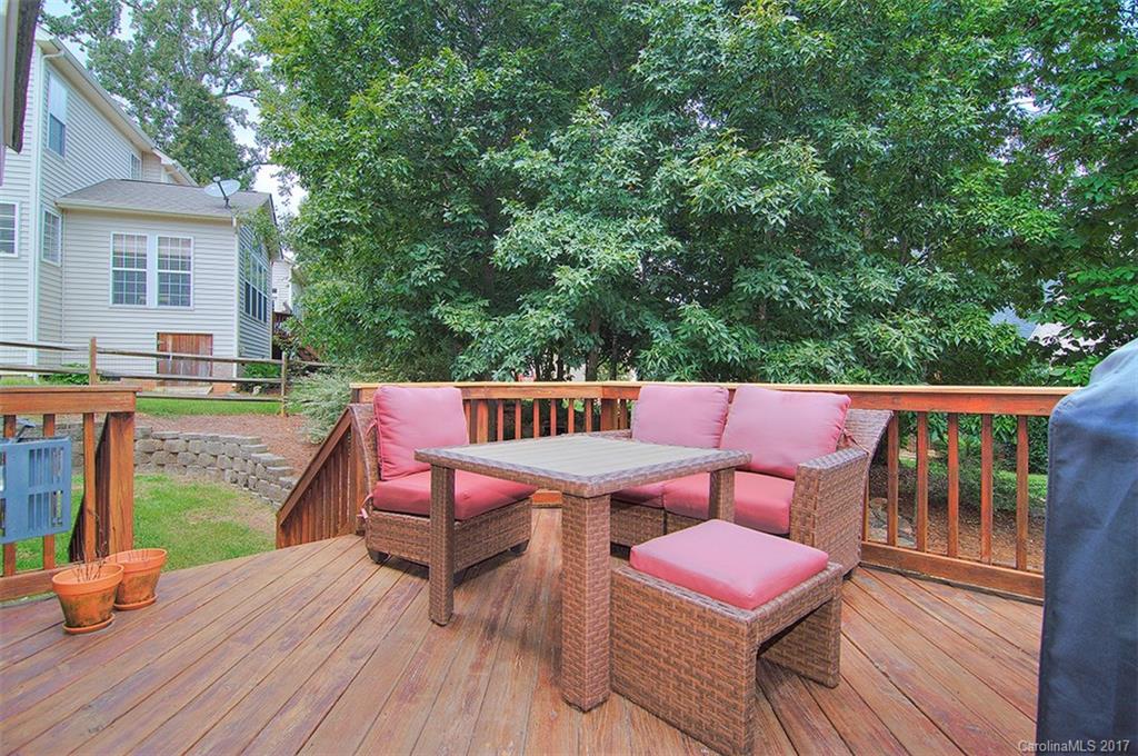 221 Choate Avenue Fort Mill, SC 29708 - Photo 23 of 24 a balcony with wooden floor and outdoor seating
