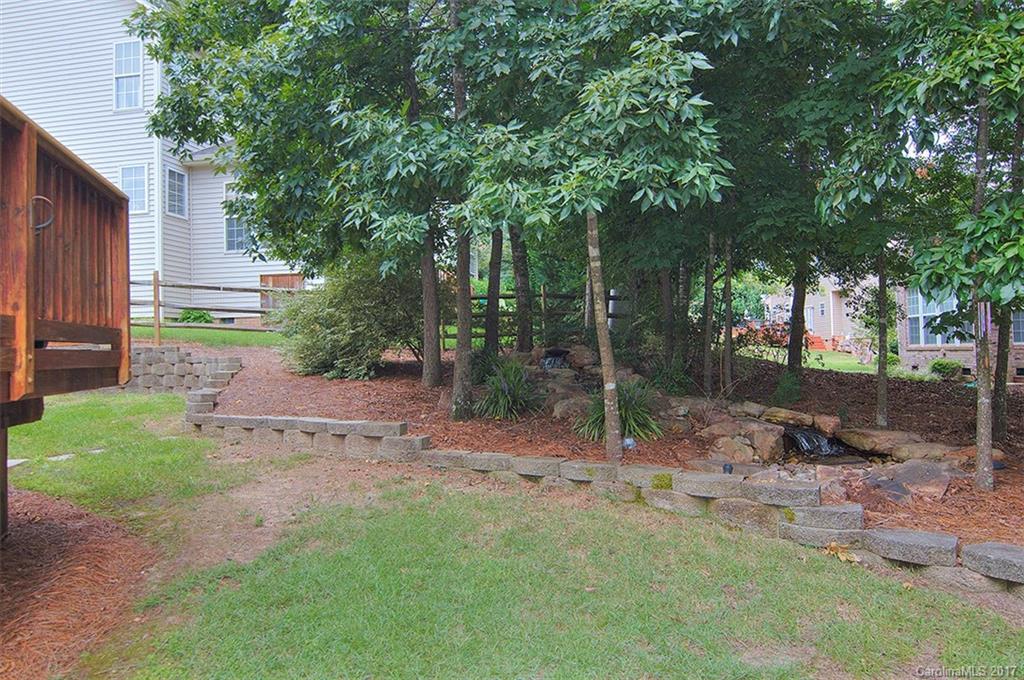 221 Choate Avenue Fort Mill, SC 29708 - Photo 24 of 24 a view of a backyard with trees