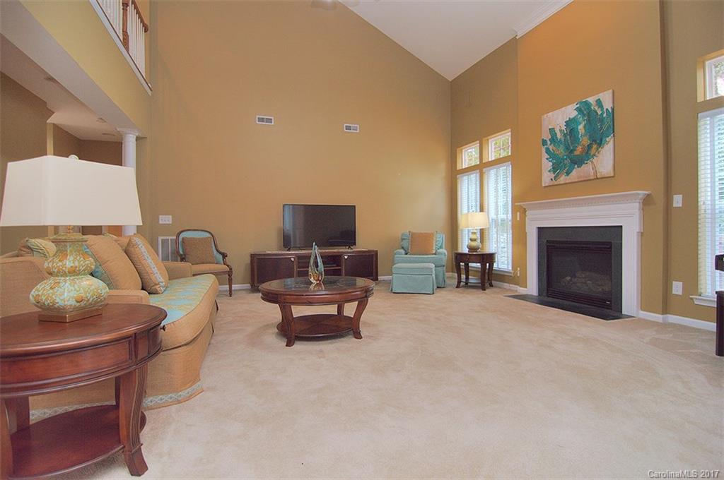 221 Choate Avenue Fort Mill, SC 29708 - Photo 10 of 24 a living room with furniture and a fireplace