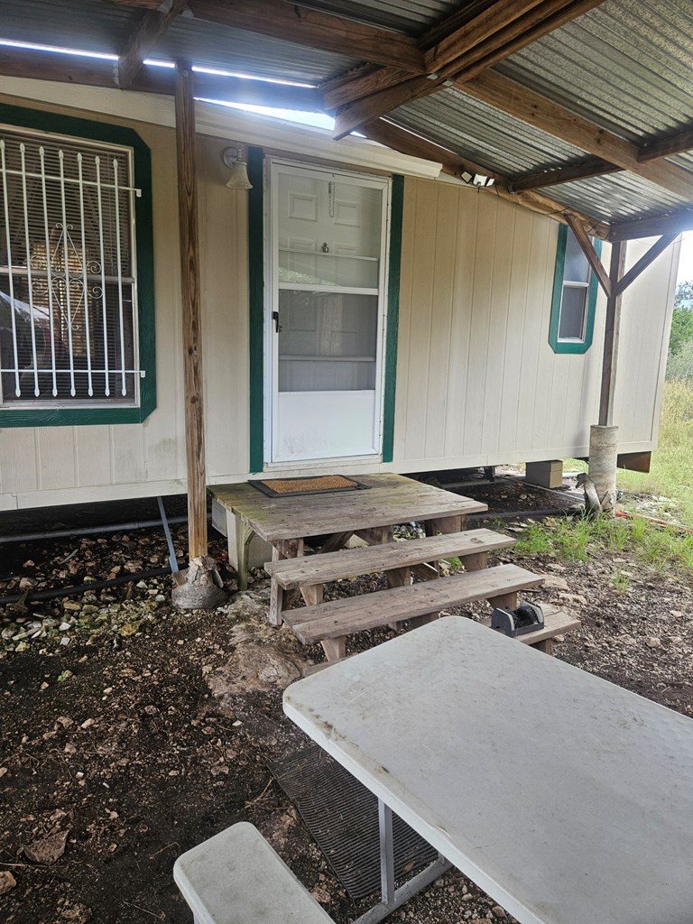 1862 Sd 31846 Rocksprings, TX 78880 - Photo 22 of 32 a front view of a house with garden
