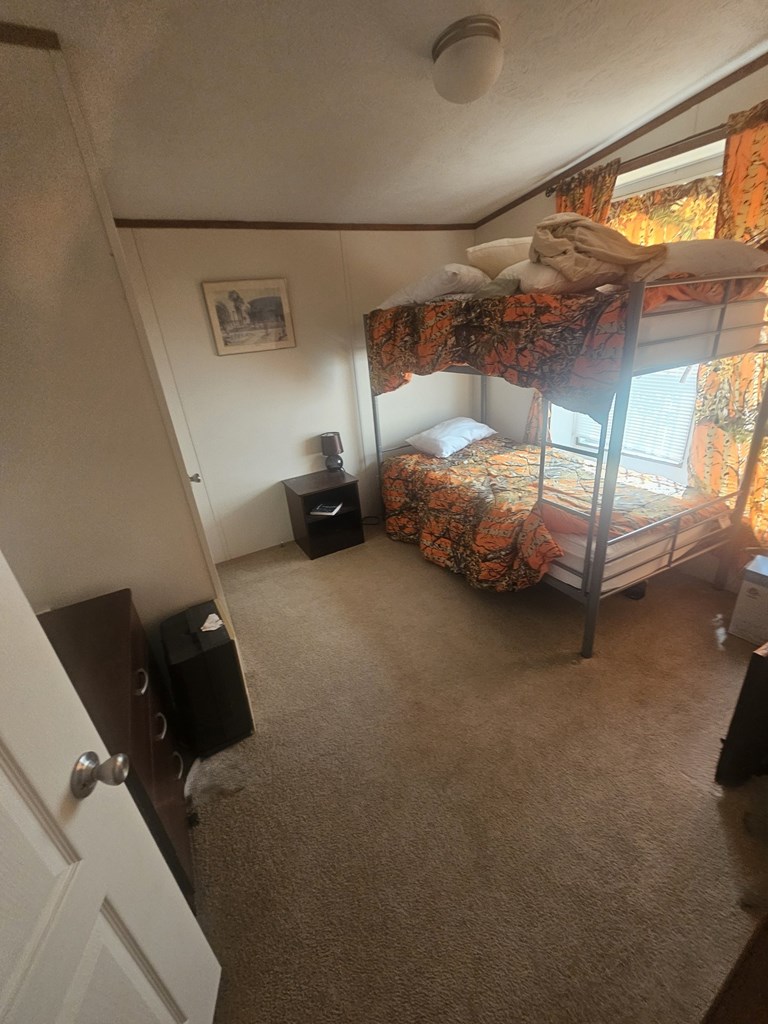 1862 Sd 31846 Rocksprings, TX 78880 - Photo 31 of 32 a bedroom with bed and window