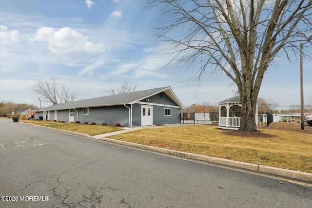 a house with trees in front of it