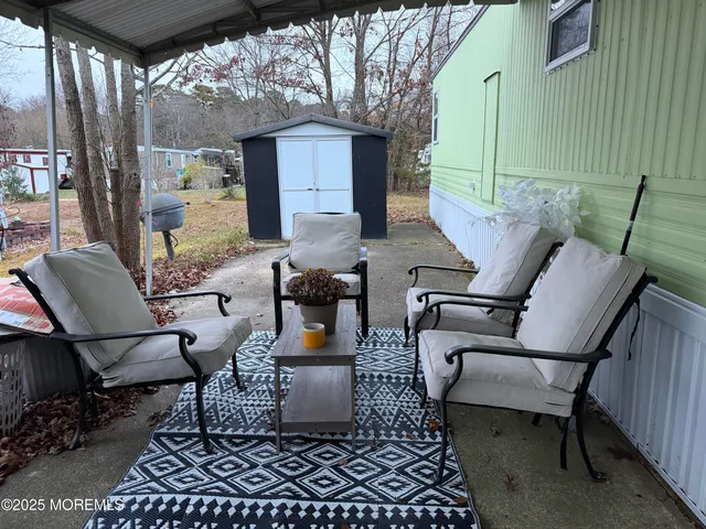 a building outdoor space with patio furniture