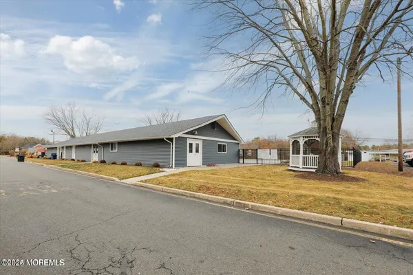 a house with trees in front of it