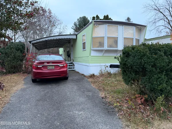 a car parked in front of a house