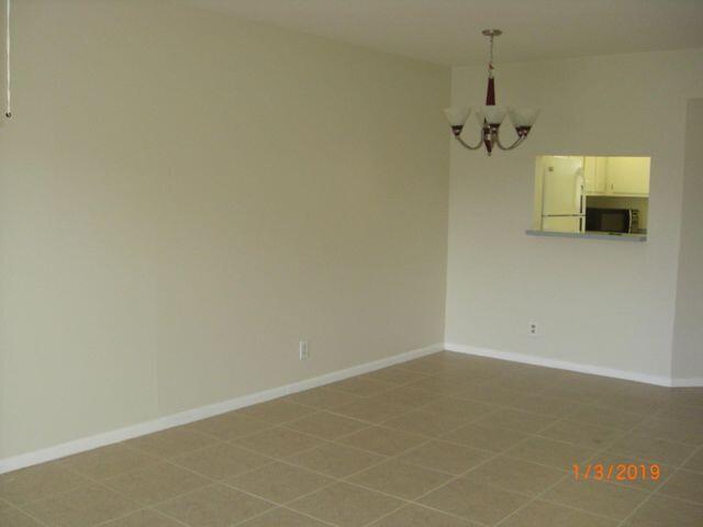 21905 Lake Forest Circle, Unit 203 Boca Raton, FL 33433 - Photo 6 of 6 woods living room