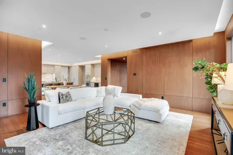 a kitchen with a table and chairs in it