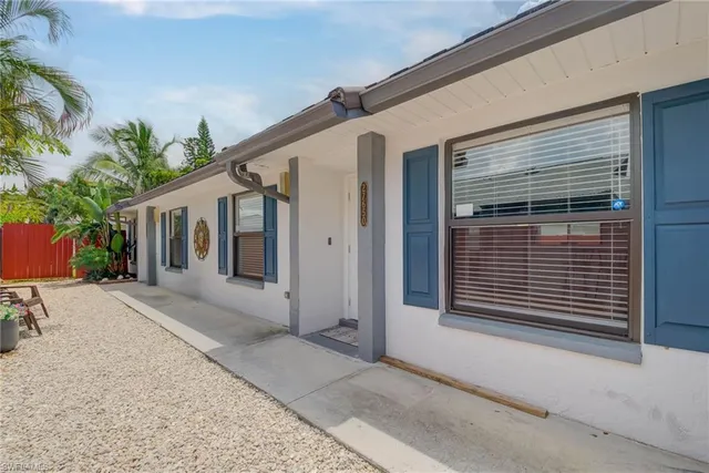 a backyard of a house with lots of green space