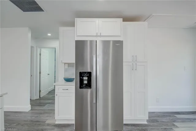 a view of a kitchen with a sink