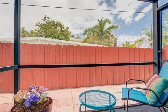 a view of a balcony with chairs