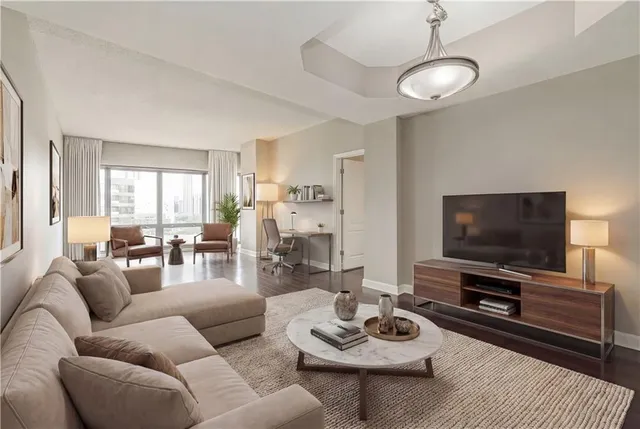 a view of a kitchen with wooden floor