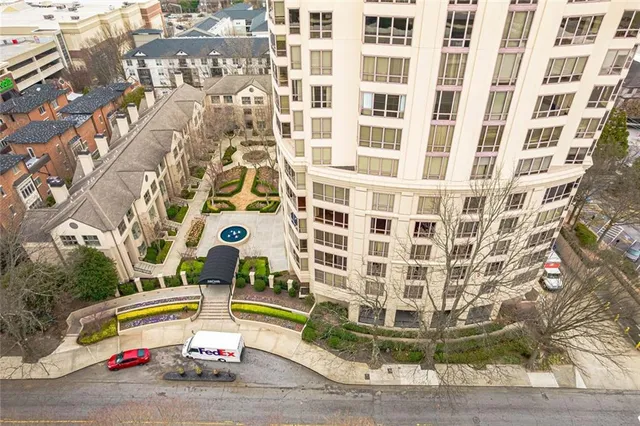 an aerial view of a red and white building