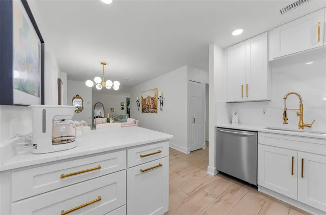 a bathroom with a sink double vanity granite and a mirror