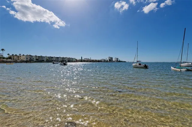 a view of a yard with swimming pool