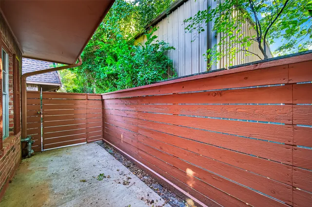 a view of a yard with an outdoor space