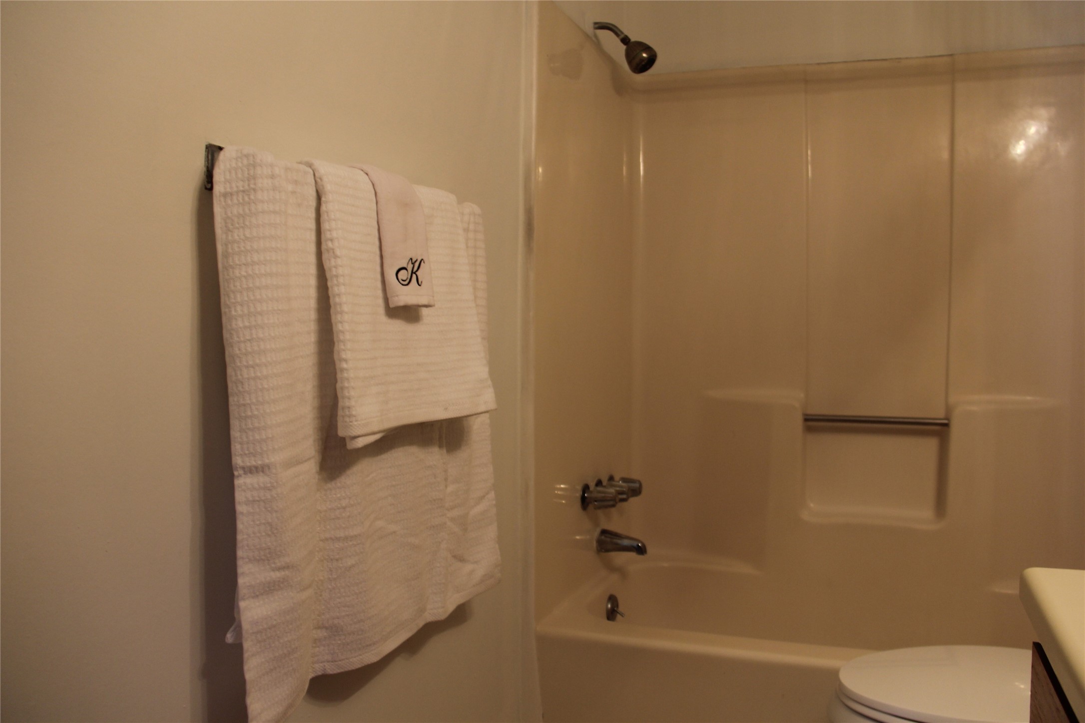 11611 Rustic Rock Drive, Unit B Austin, TX 78750 - Photo 17 of 25 a bathroom with a shower and a toilet