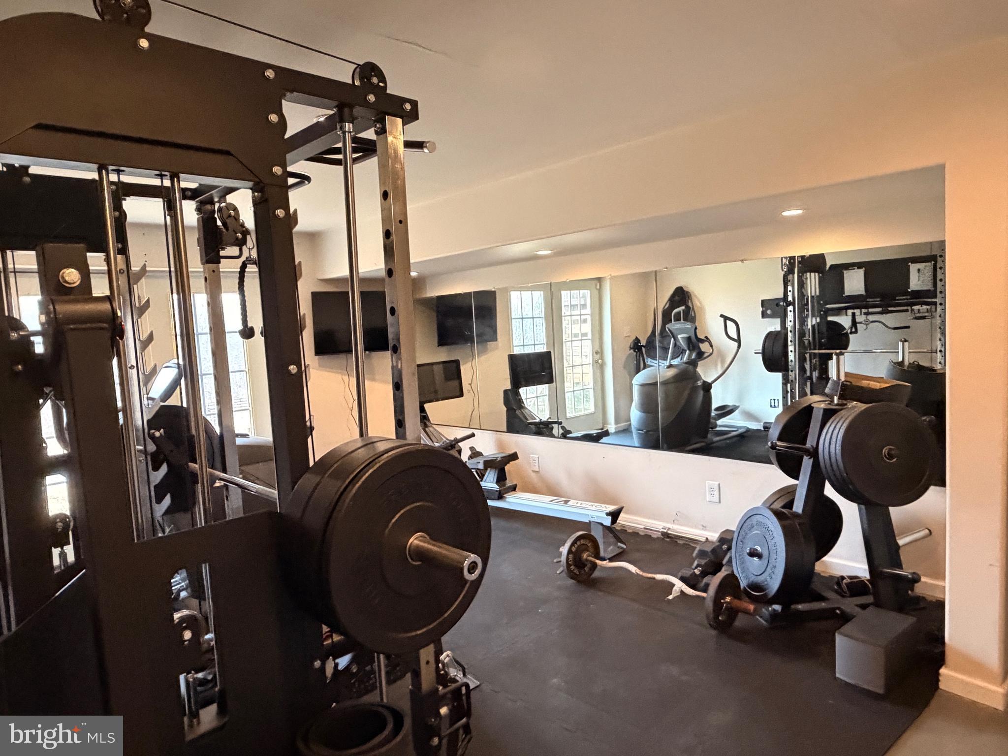 13028 Dreamers Path Culpeper, VA 22701 - Photo 13 of 13 a view of a room with gym equipment