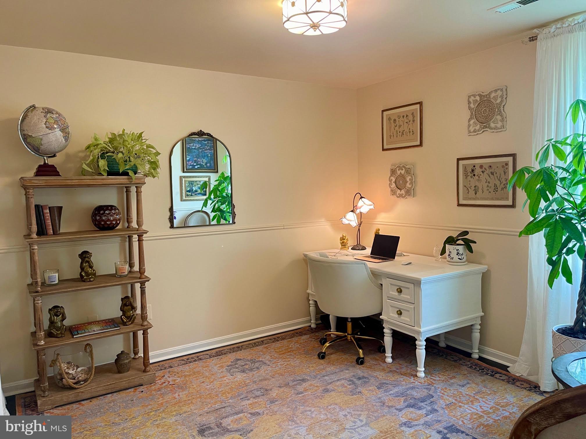 13028 Dreamers Path Culpeper, VA 22701 - Photo 8 of 13 a view of a dining room with furniture and wooden floor
