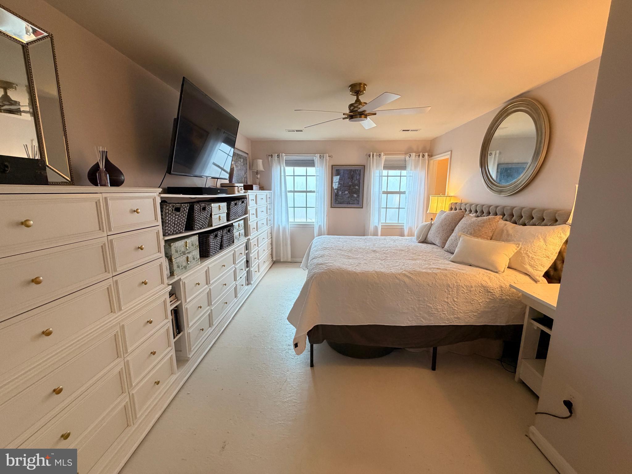 13028 Dreamers Path Culpeper, VA 22701 - Photo 10 of 13 a bedroom with furniture and a flat screen tv