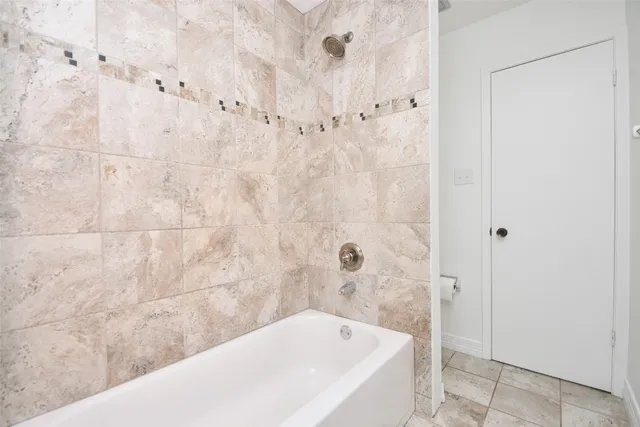 a bathroom with a bathtub