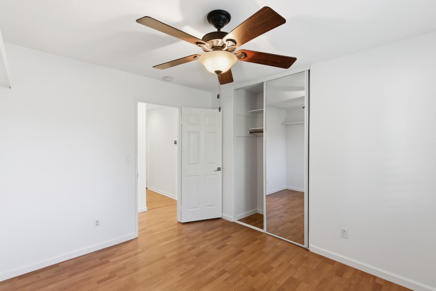 50 Nottingham Place Clayton, CA 94517 - Photo 24 of 41 a view of an empty room with wooden floor