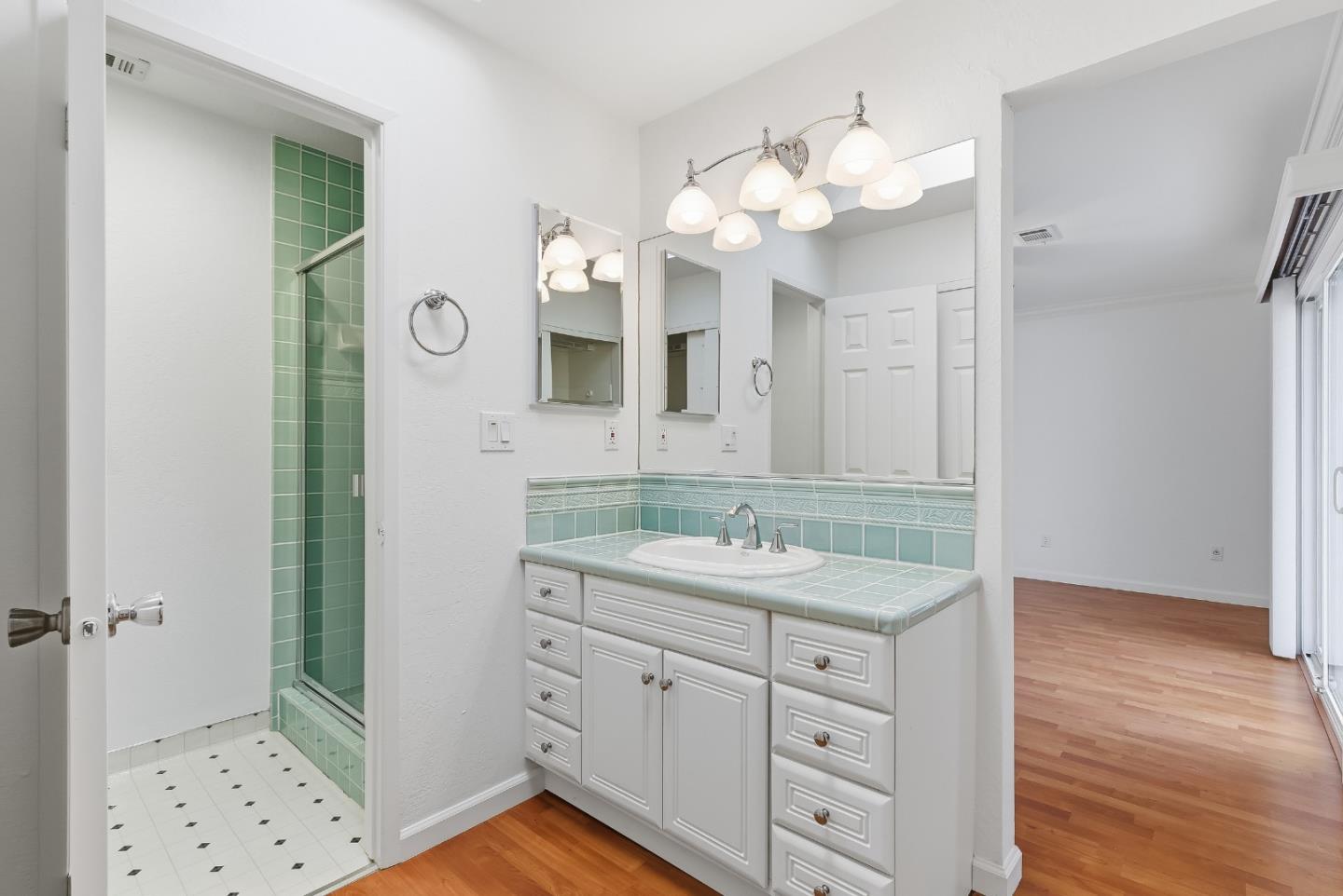 50 Nottingham Place Clayton, CA 94517 - Photo 27 of 41 a bathroom with a sink vanity and mirror