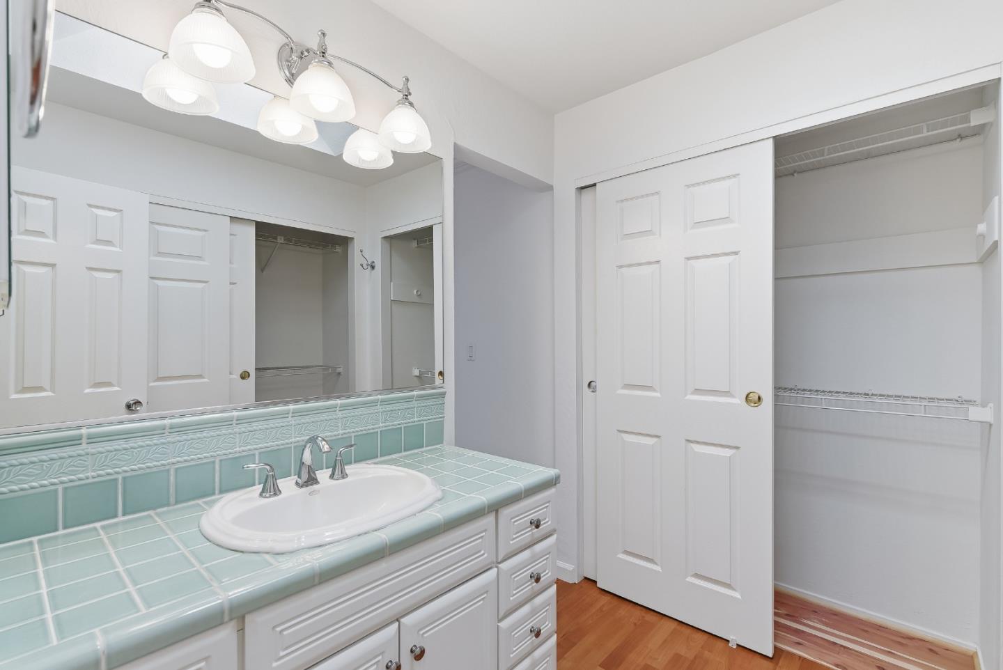 50 Nottingham Place Clayton, CA 94517 - Photo 28 of 41 a bathroom with a sink and a mirror