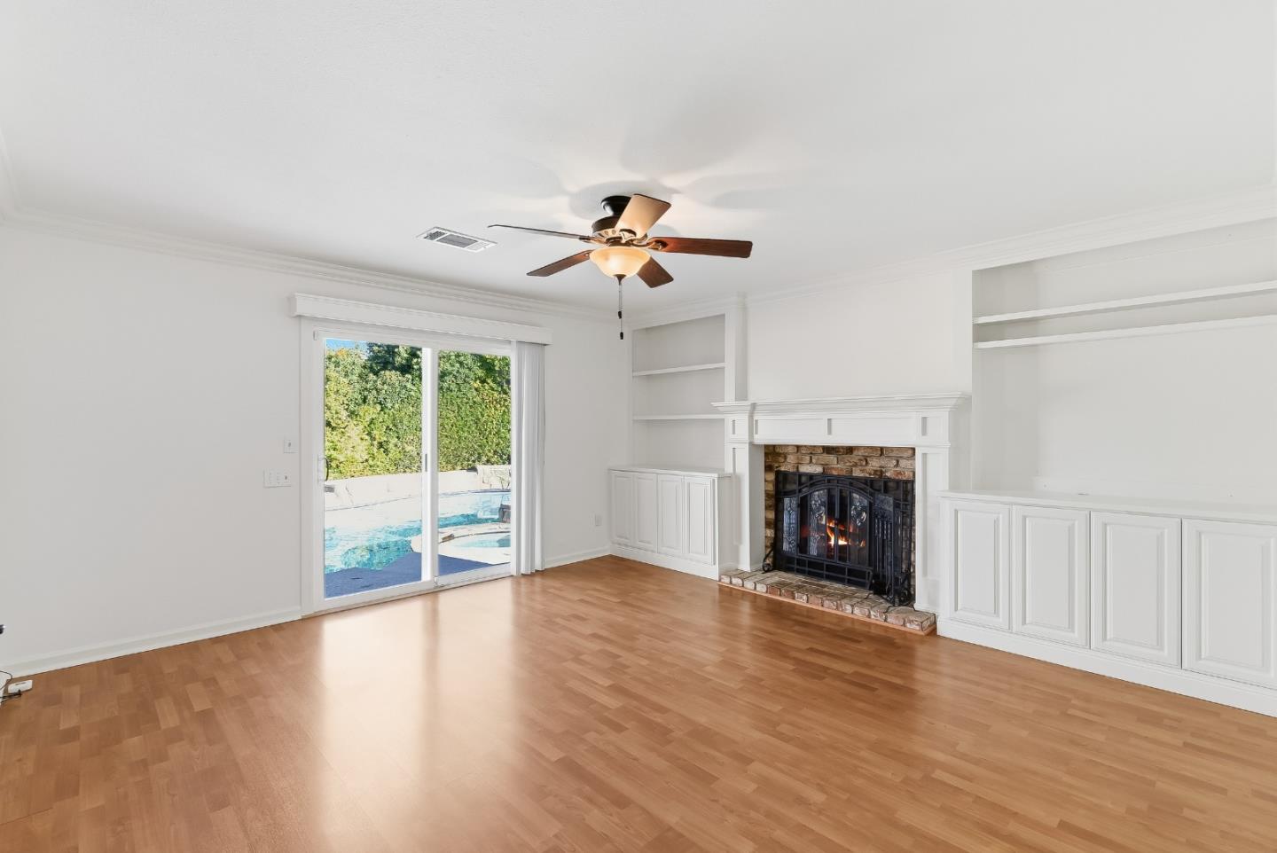 50 Nottingham Place Clayton, CA 94517 - Photo 5 of 41 an empty room with fireplace fan and windows