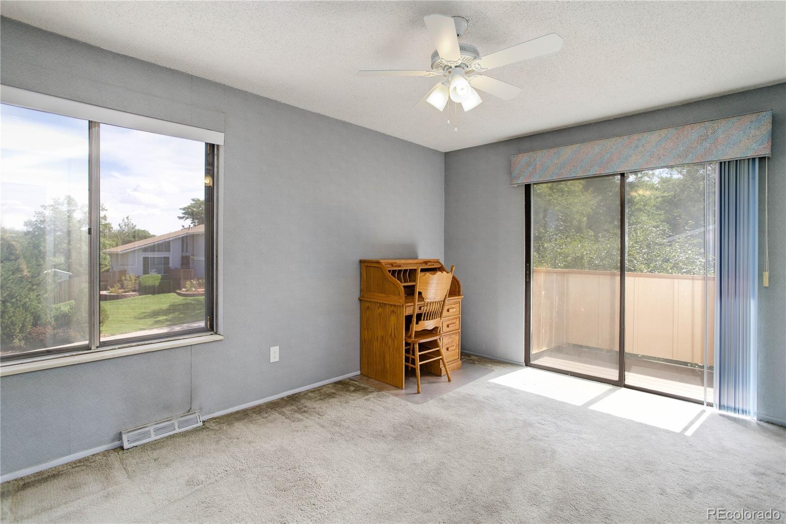 7347 South Ridgeview Drive Littleton, CO 80120 - Photo 22 of 36 an empty room with windows and closet
