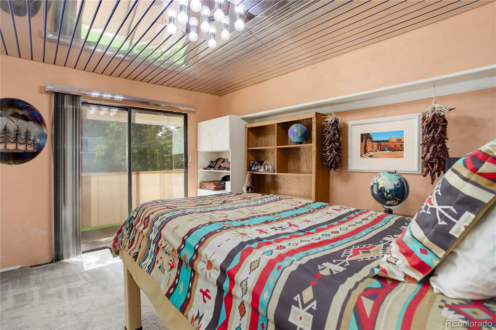 7347 South Ridgeview Drive Littleton, CO 80120 - Photo 24 of 36 a bedroom with a bed and a window