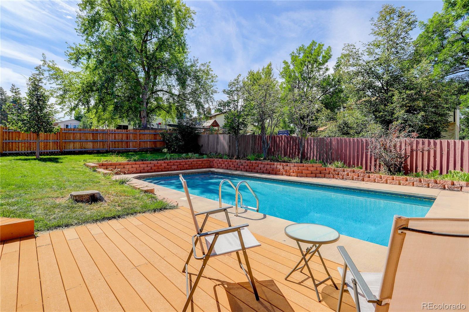 7347 South Ridgeview Drive Littleton, CO 80120 - Photo 35 of 36 a view of swimming pool with a patio